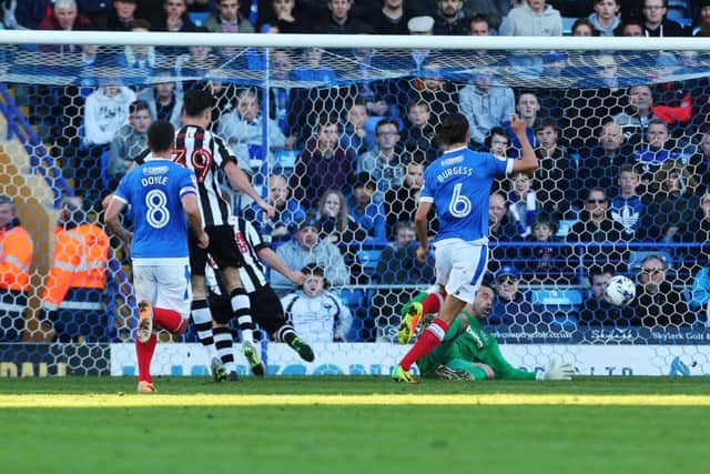 Adam Campbell scores Notts County's second goal against Pompey Picture: Joe Pepler