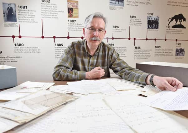 Michael Gunton, Senior Archivist at Portsmouth Archive Service 

with a  collection of unpublished letter by Sherlock Holmes author Sir Arthur Conan Doyle. Picture:  Zachary Culpin/Solent News & Photo Agency
UK