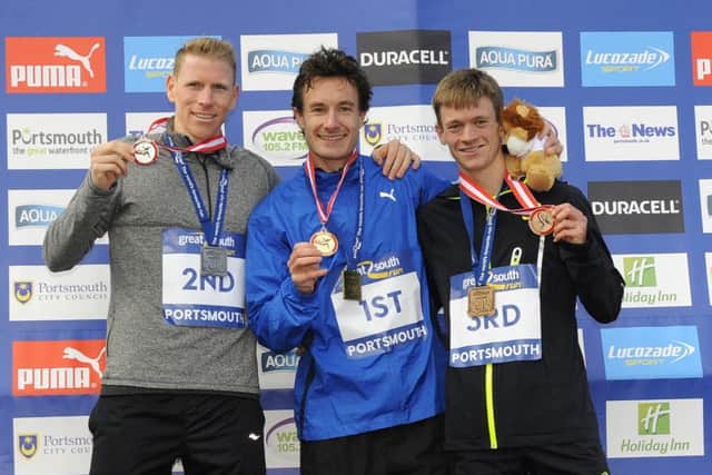 Chris Thompson, centre, claimed Great South Run glory ahead of Andy Vernon, left, and Matt Sharp Picture: Malcolm Wells