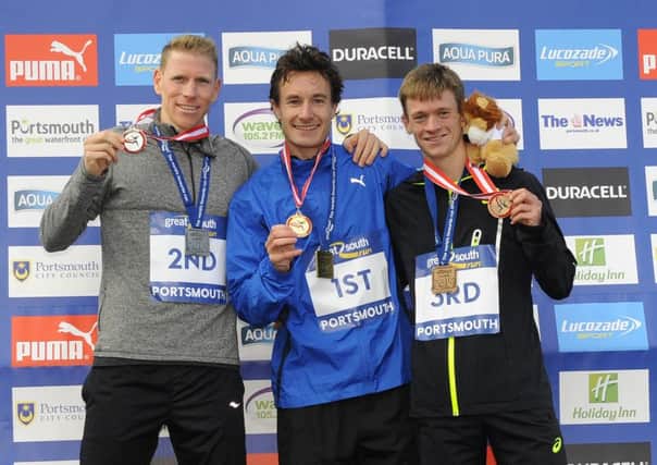 Chris Thompson, centre, claimed Great South Run glory ahead of Andy Vernon, left, and Matt Sharp Picture: Malcolm Wells