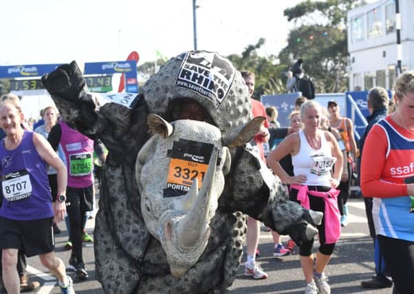 Elly McMeehan completes the Great South Run dressed as a rhino 

Picture: Paul Jacobs (160271-44)