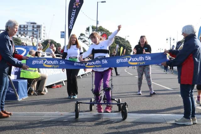 Natasha Lambert, 19, makes it cross the finish line. Photo: Habibur Rahman