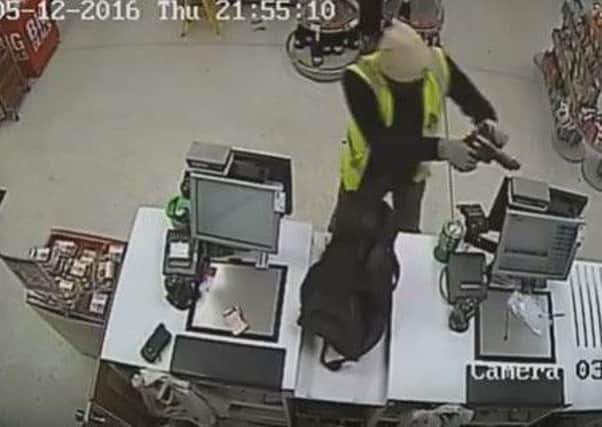 CCTV of Anthony Journet holding up the Co-op store in Clanfield