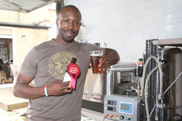 Pierre Adedze from the Portsmouth Home Brew Club, won Best in Show at the National Home Brew competition Picture: Habibur Rahman (161456-48)