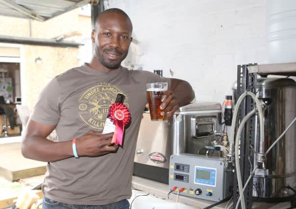 Pierre Adedze from the Portsmouth Home Brew Club, won Best in Show at the National Home Brew competition Picture: Habibur Rahman (161456-48)