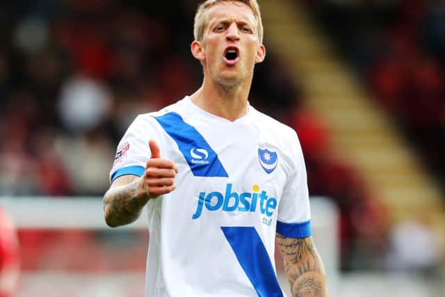 Pompey midfielder Carl Baker Picture: Joe Pepler