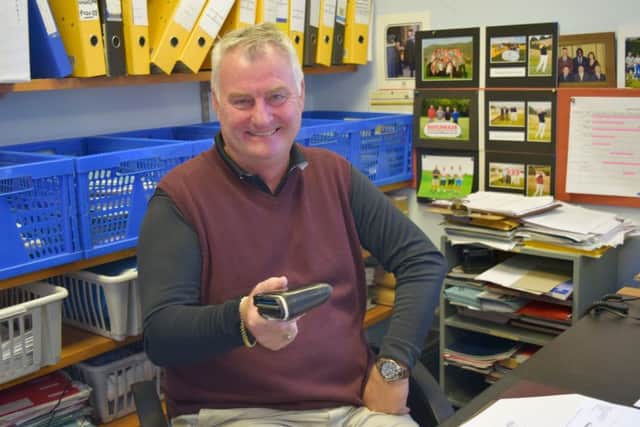 Relieved Michael Ellwood with his recovered wallet
Picture: Loughlan Campbell