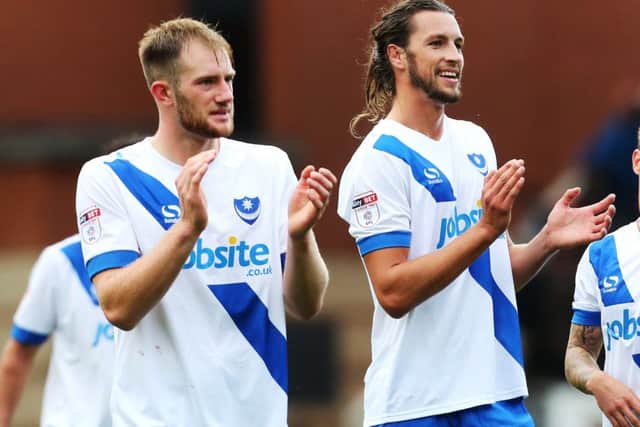 Matt Clarke and Christian Burgess were a key central-defensive partnership for Pompey last season Picture: Joe Pepler