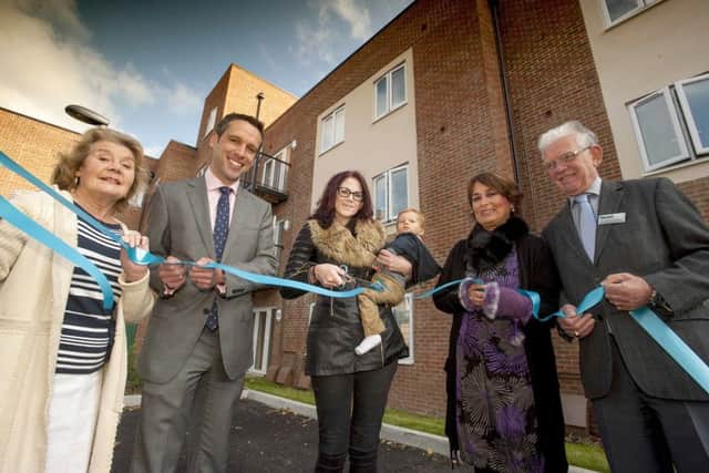 From left, Cllr Elaine Shimbart, Stonewater's executive director for development Jonathan Layzell, resident Lucy Clilverd with son Ezra; Stonewater's board member Sheila Collins and Cllr Gerald Shimbart, Havant Borough Council