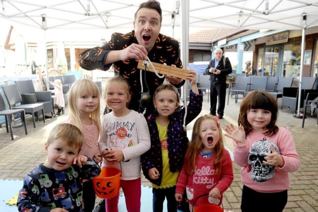 Silly Scott with, from left, Harry Ford, two, Jessica Cleife, four, Sophie Ford, four, Isabelle Sutton, four, Mabel Drain, two, and Lacey Brice, four Picture: Sarah Standing (161473-9018)