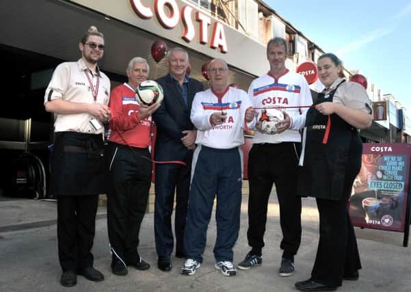 From left, assistant manager Connor Harcourt, Emsworth and Hayling Football Club member Craig Bassant, owner Robin Arkle, footballers Steve Savage  and Colin Thomas and manager Jenni Speight 
Picture: Mick Young (161173-03)