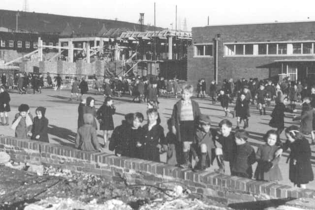 Children at play in the playground of the new, and still being built, Hillside School, Paulsgrove. (Barry Cox collection)