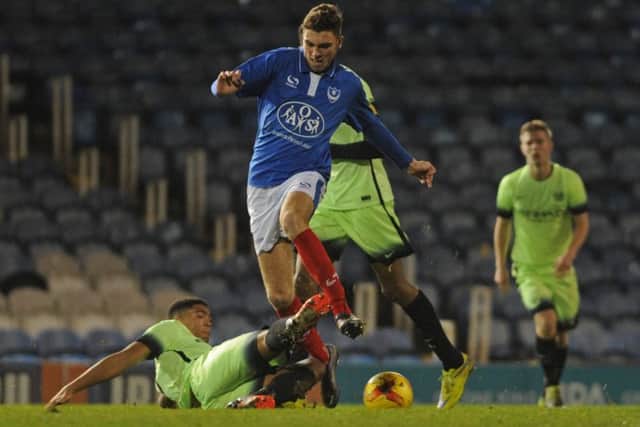 Harvey Bradbury in action against Manchester City last season. Picture: Ian Hargreaves