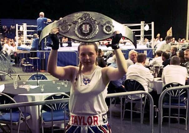 Heart of Portsmouth boxer Taylor Smith with her English Title Belt