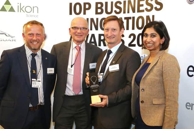 Fareham MP Suella Fernandes with, from left, Kevin Lancaster from Aqua Cooling, Roy Sambles IOP President and Simon Davis from Aqua Cooling