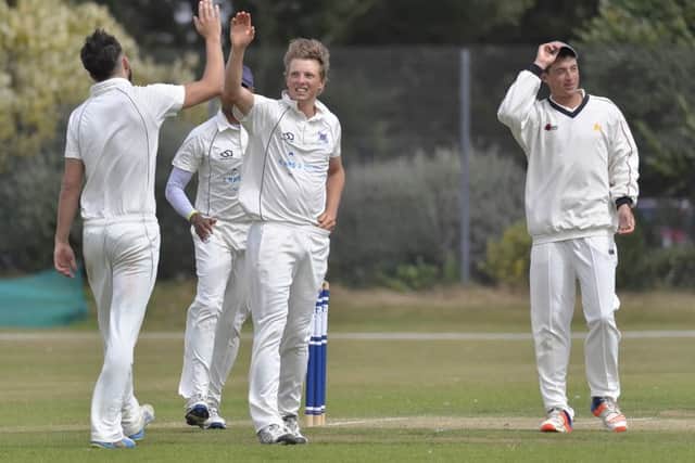 Fraser Hay celebrates a wicket at Portsmouth during the summer. Picture: Neil Marshall