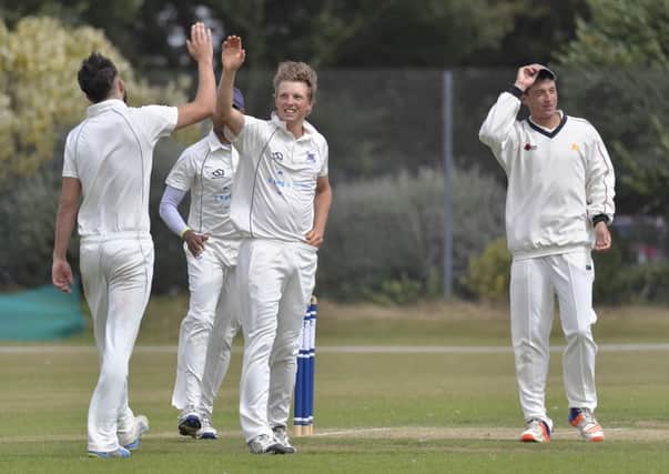 Fraser Hay celebrates a wicket at Portsmouth during the summer. Picture: Neil Marshall
