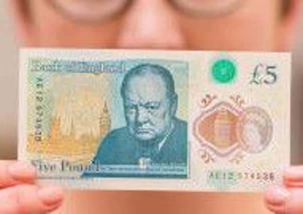 The note features Sir Winston Churchill 5c5d7c14-4600-4f8b-8783-7d9f074e