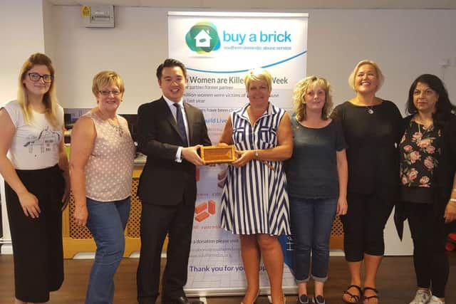 Havant MP Alan Mak with the team from the Southern Domestic Abuse Service