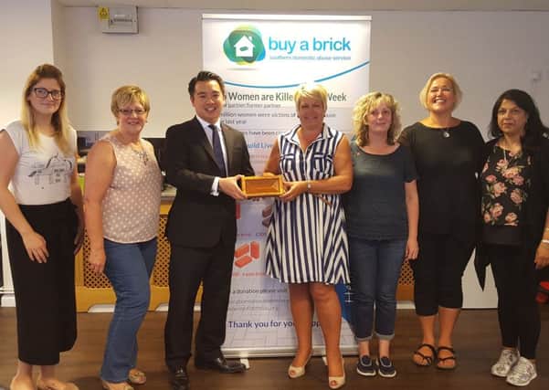 Havant MP Alan Mak with the team from the Southern Domestic Abuse Service