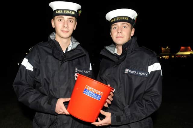 Air Engineering Technicians Aidan Stewert, 19, left, and Steffan Forth, 22, collecting for the Poppy Appeal.
Picture: Sarah Standing (161480-6335)