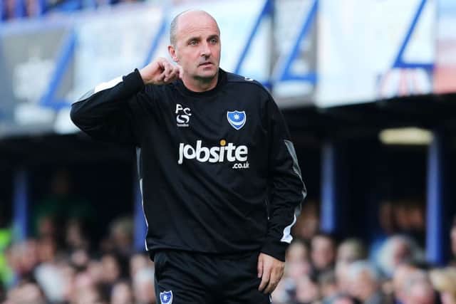 Who should Pompey boss Paul Cook select for tomorrow's trip to Cambridge United?   Picture: Joe Pepler