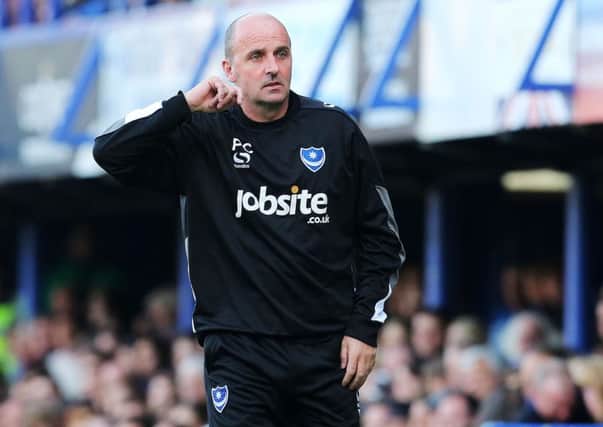 Who should Pompey boss Paul Cook select for tomorrow's trip to Cambridge United?   Picture: Joe Pepler