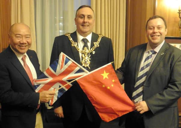 From left, Portsmouth Chinese Association chairman Albert Choi, Lord Mayor of Portsmouth Cllr David Fuller and Cllr Lee Mason