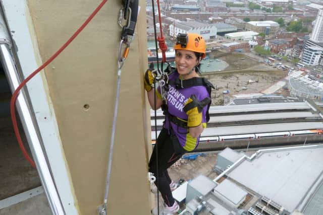 Surbjit Jassi abseiling down the Spinnaker Tower