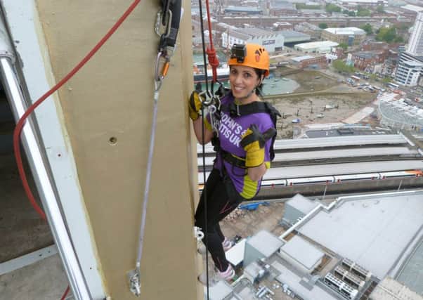 Surbjit Jassi abseiling down the Spinnaker Tower