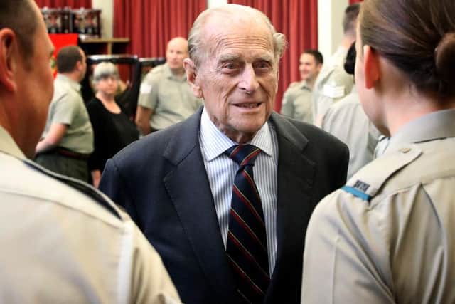 His Royal Highness, Prince Philip, Duke of Edinburgh talks to students at the Royal Marines School of Music Picture: L(Phot) Iggy Roberts