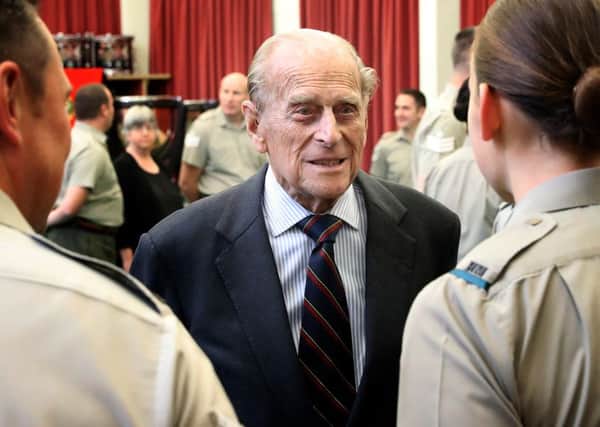 His Royal Highness, Prince Philip, Duke of Edinburgh talks to students at the Royal Marines School of Music Picture: L(Phot) Iggy Roberts