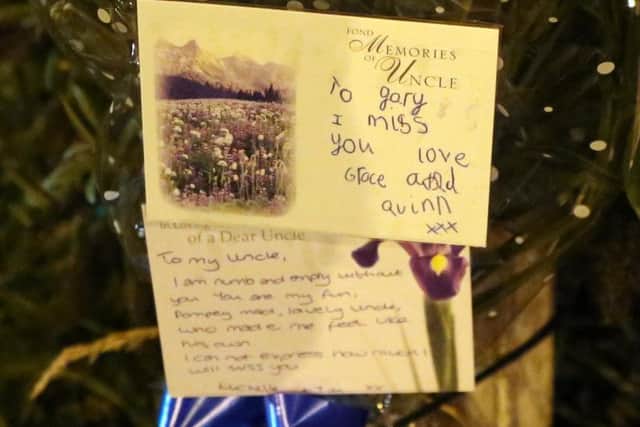 Floral tributes have been left by family members