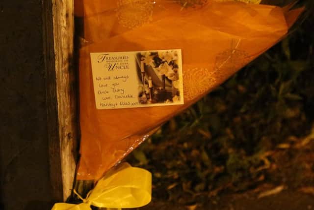 Floral tributes have been left by family members