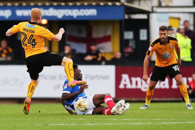 Amine Linganzi saw red for lunging into a 61st-minute tackle with Cambridge subsitute Conor Newton in yesterday's 1-0 win at the U's Picture: Joe Pepler