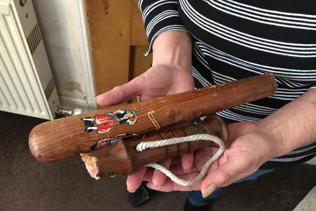 The bat Linda Graham used to fend off a man who tried to flee from police into her house.