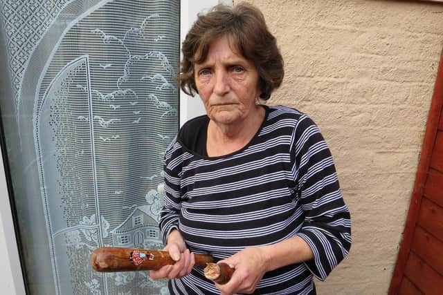 Linda Graham fended off a man who tried to flee from police into her house.