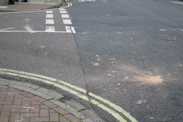 The aftermath in Widley Road, Stamshaw, after the stand-off. Cleaners have cleared up tiles and rubble from the street.