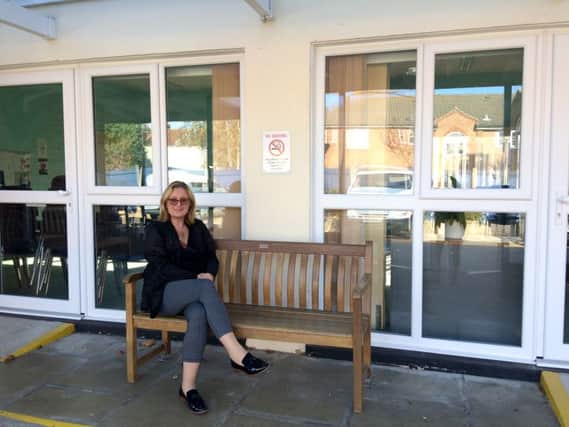 Lynne Rigby outside Southsea community centre which now has new windows and a new boiler thanks to Veolia