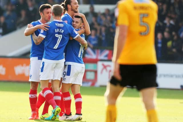 Conor Chaplin celebrates his goal at Cambridge. Picture: Joe Pepler