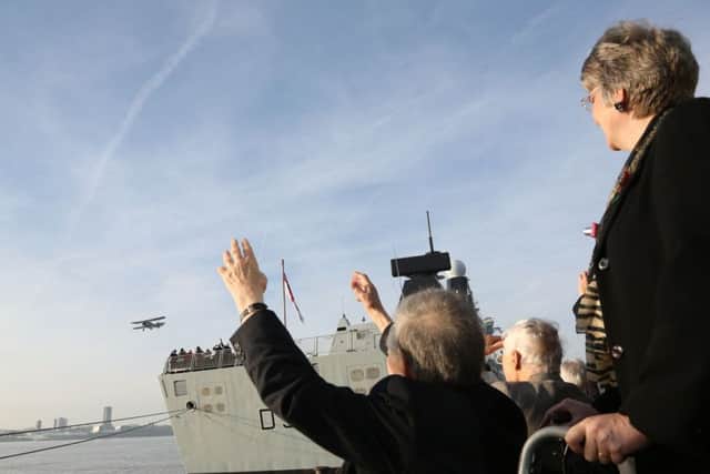 A Swordfish Biplane flying over HMS Dragon in Liverpool at the commemoration of the 75th anniversary of the Arctic Convoys. 
Picture: MoD/Crown Copyright/PA Wire