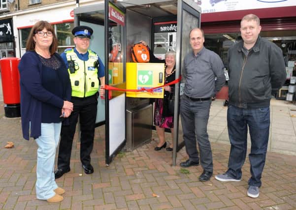 From left, Anna Morgan, PCSO Alex McDonald, The Mayor of Havant Faith Ponsonby and Mark Smith, chairman of Leigh Park Traders, and Alan Morgan. 

Picture: Sarah Standing (161409-4664)