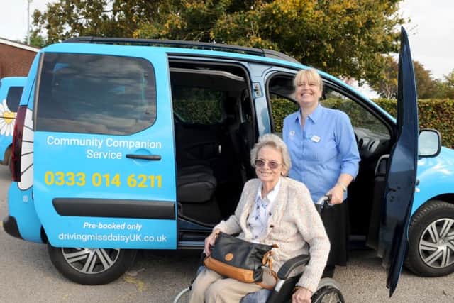 Carolyn Sharples with client Pat Webb at the launch of Driving Miss Daisy  at Hayling Island Community Centre. Pictured is: Picture: Sarah Standing (161481-5937)