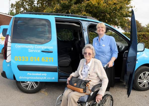 Carolyn Sharples with client Pat Webb at the launch of Driving Miss Daisy  at Hayling Island Community Centre. 

Pictured is: 

Picture: Sarah Standing (161481-5937)
