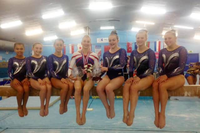 Dynamo gymnasts shone in the 35th Rushmoor Rosebowl competition. Left to right: Elise Blisset, Tayah Askham, Leah Mitchell, Kelly Simm, Olivia Essex, Jessica Wells and Danielle Barnes