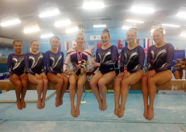 Dynamo gymnasts shone in the 35th Rushmoor Rosebowl competition. Left to right: Elise Blisset, Tayah Askham, Leah Mitchell, Kelly Simm, Olivia Essex, Jessica Wells and Danielle Barnes