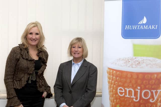 Caroline Dinenage MP meets Rosemary Mason from Huhtamaki in 2013
