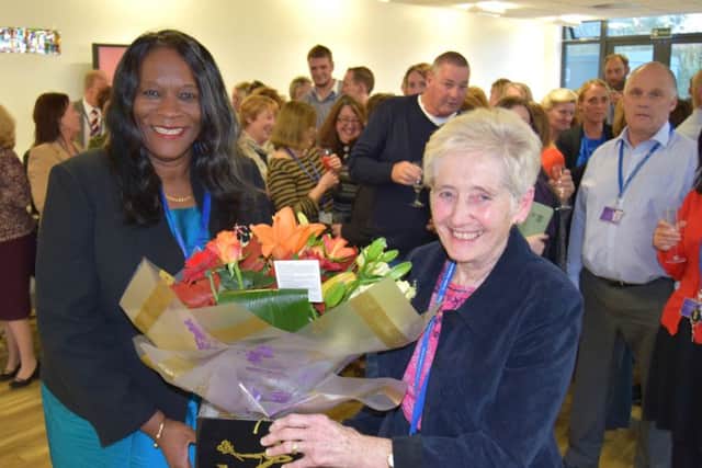 Higbury College principal and chief executive Stella Mbubaegbu, left, hands flowers over to Barbara Green during her retirement party
Picture: Tom Cotterill.