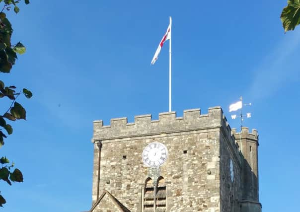 The Easter Cross flag flag flying from the flagpole at St Faiths Church, Havant