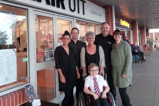 From left, Bernie Aranibar, Greg Ott, Barb Horsfall, Scott Lyons and Carly Lyons with Finlay Lyons, front